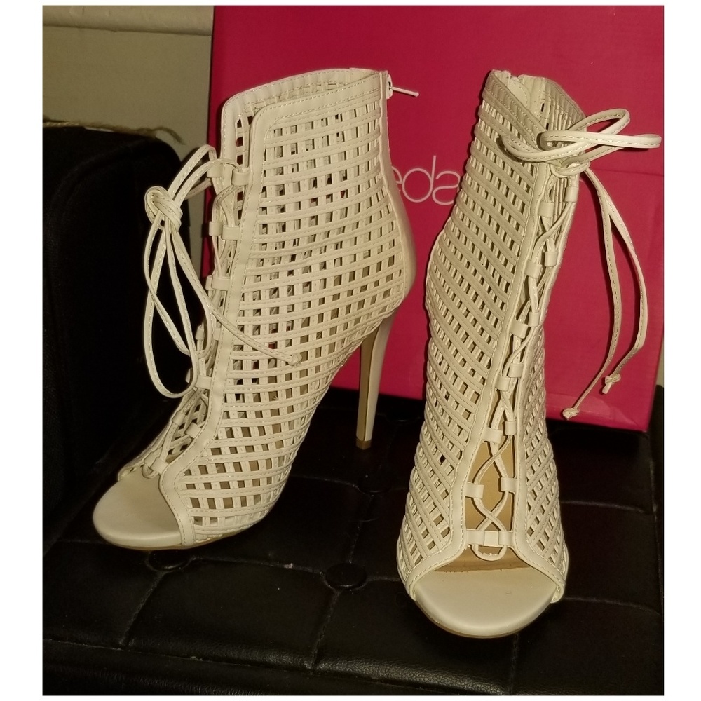 Open toed, laced heels